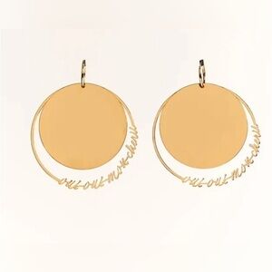 - NWT. Zara Golden Round Flat Metal Earrings with Text Detail.